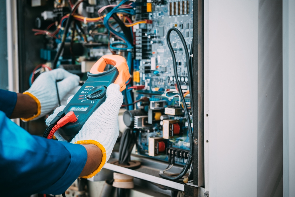 Technician checking a unit